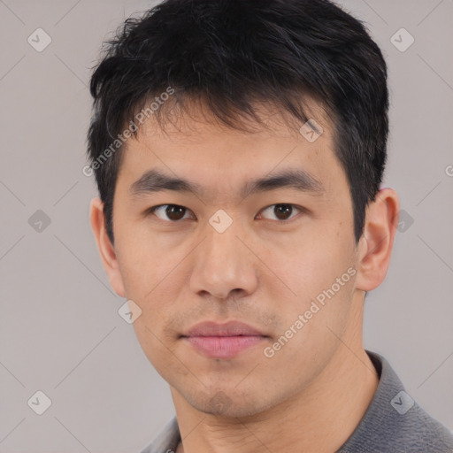 Neutral asian young-adult male with short  black hair and brown eyes