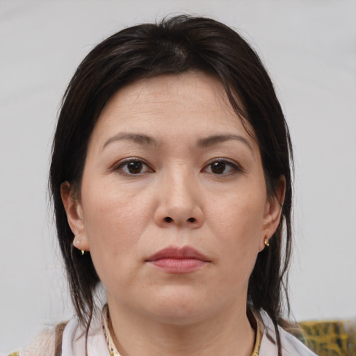 Neutral white young-adult female with medium  brown hair and brown eyes