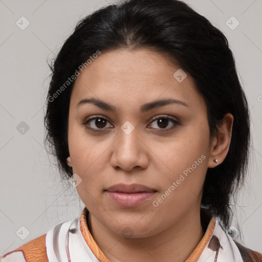 Joyful latino young-adult female with medium  brown hair and brown eyes