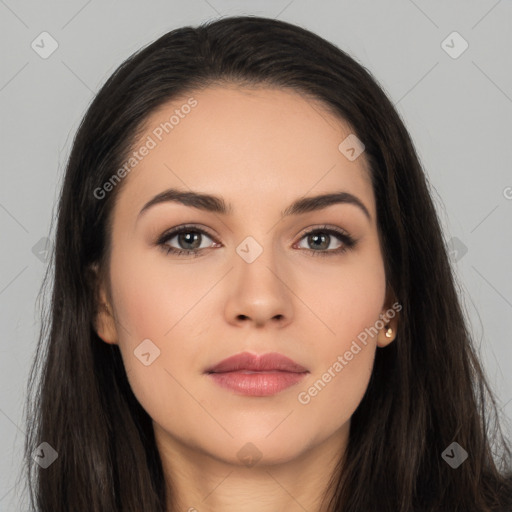 Neutral white young-adult female with long  brown hair and brown eyes