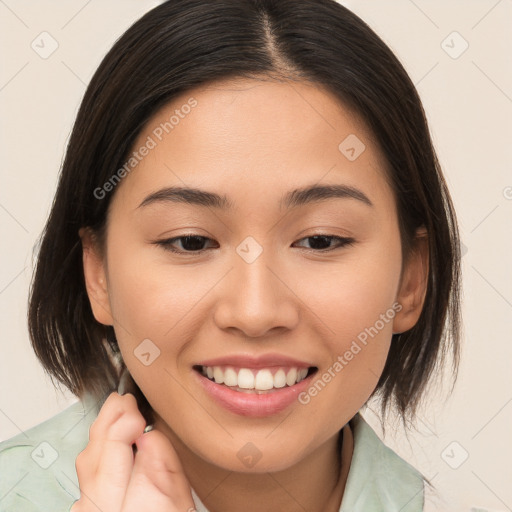 Joyful white young-adult female with medium  brown hair and brown eyes