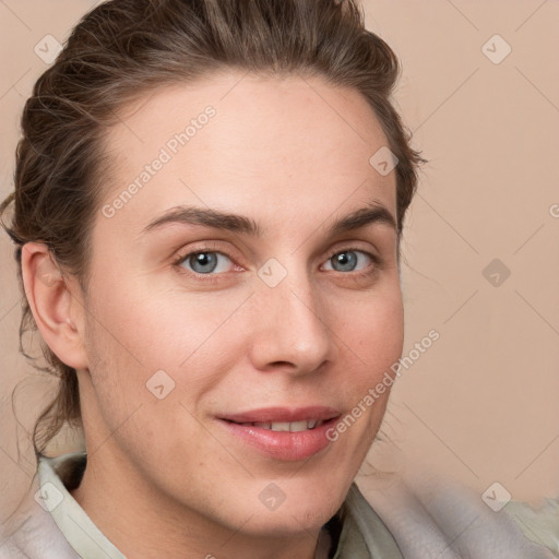 Joyful white young-adult female with medium  brown hair and blue eyes