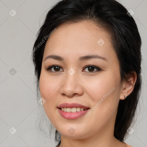 Joyful white young-adult female with medium  brown hair and brown eyes