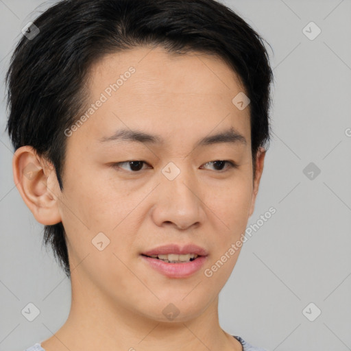 Joyful asian young-adult female with short  brown hair and brown eyes