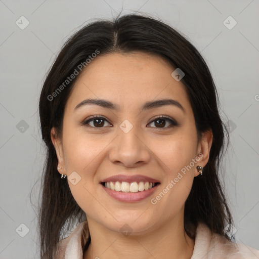 Joyful latino young-adult female with long  brown hair and brown eyes