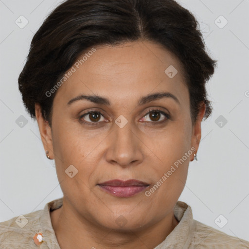 Joyful latino young-adult female with short  brown hair and brown eyes