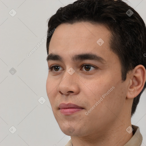 Neutral white young-adult male with short  black hair and brown eyes