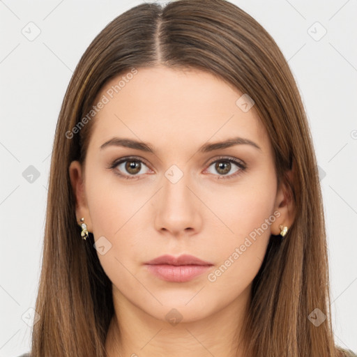 Neutral white young-adult female with long  brown hair and brown eyes