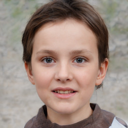 Joyful white child female with short  brown hair and brown eyes