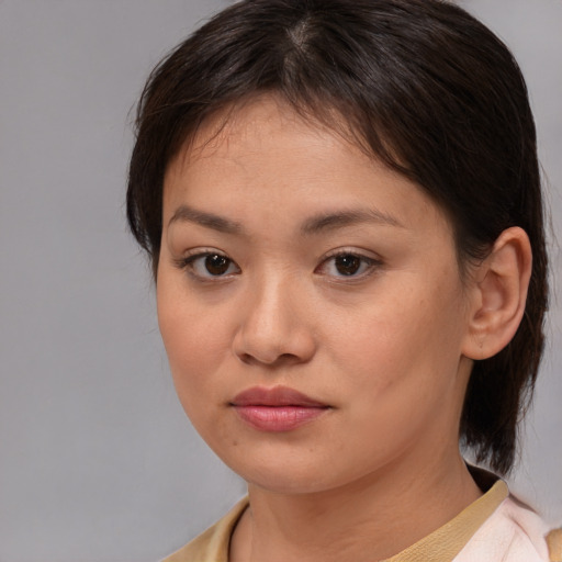 Neutral white young-adult female with medium  brown hair and brown eyes