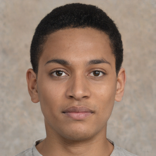 Neutral latino young-adult male with short  brown hair and brown eyes