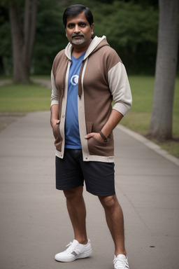 Indian middle-aged male with  brown hair