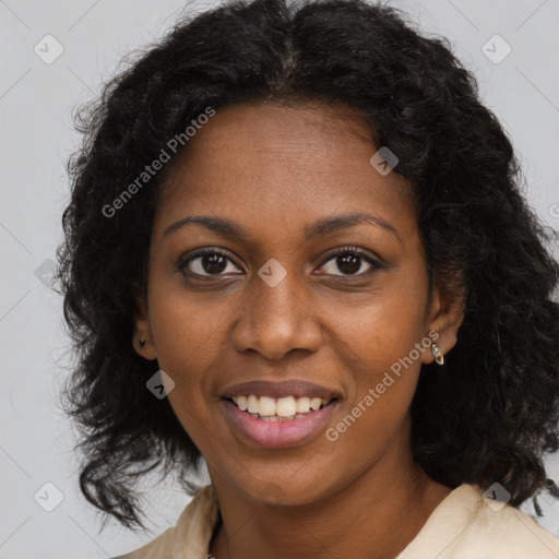 Joyful black young-adult female with long  brown hair and brown eyes