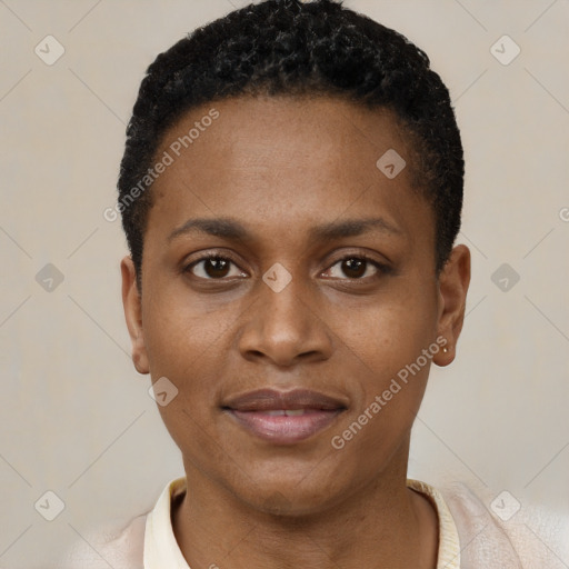 Joyful black young-adult female with short  black hair and brown eyes