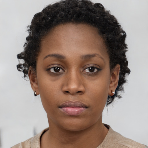 Neutral black young-adult female with short  brown hair and brown eyes