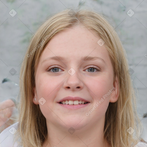 Joyful white young-adult female with medium  brown hair and blue eyes