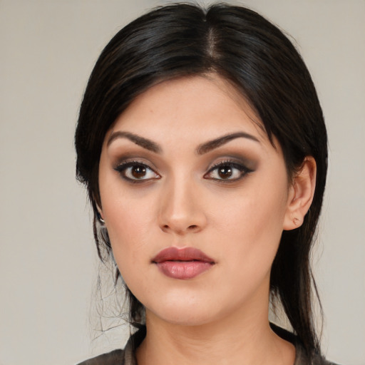 Neutral white young-adult female with medium  black hair and brown eyes
