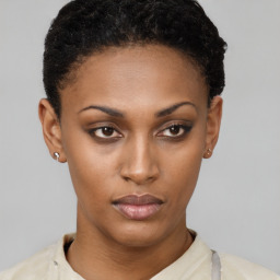 Neutral black young-adult female with short  black hair and brown eyes