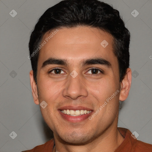 Joyful white young-adult male with short  black hair and brown eyes