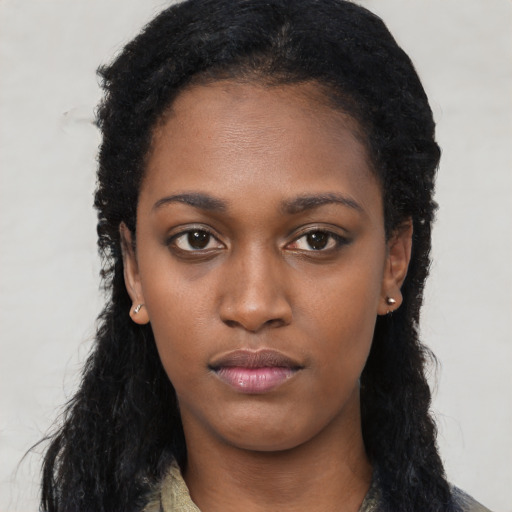 Neutral black young-adult female with long  black hair and brown eyes