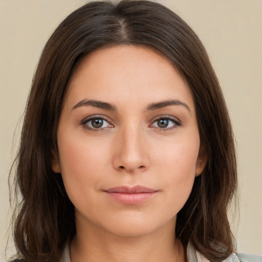 Neutral white young-adult female with medium  brown hair and brown eyes