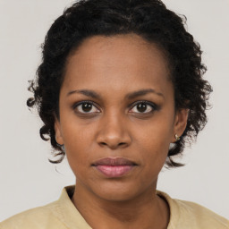 Neutral black young-adult female with short  brown hair and brown eyes