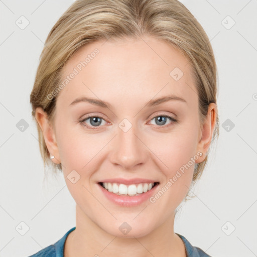 Joyful white young-adult female with medium  brown hair and blue eyes