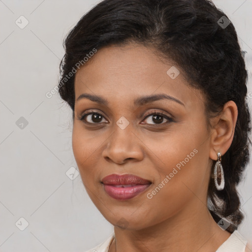 Joyful black young-adult female with medium  brown hair and brown eyes