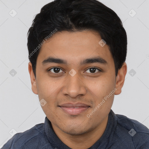 Joyful latino young-adult male with short  black hair and brown eyes