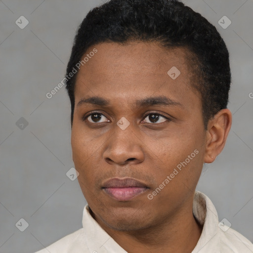 Neutral black young-adult male with short  black hair and brown eyes