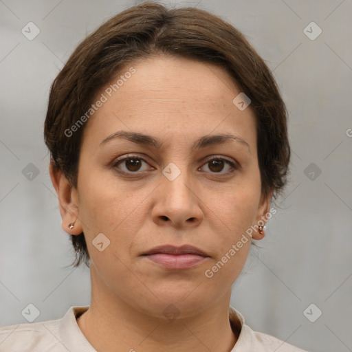 Joyful white adult female with short  brown hair and brown eyes