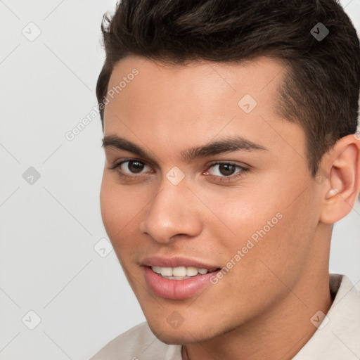 Joyful white young-adult male with short  brown hair and brown eyes