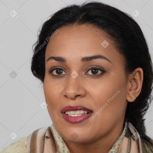 Joyful latino young-adult female with long  brown hair and brown eyes