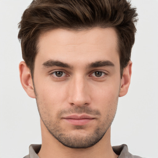 Neutral white young-adult male with short  brown hair and brown eyes