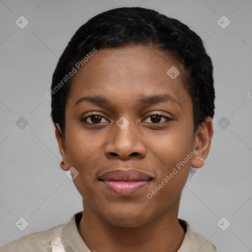 Joyful black young-adult female with short  black hair and brown eyes