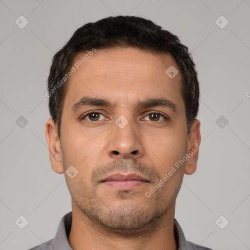Neutral white young-adult male with short  brown hair and brown eyes