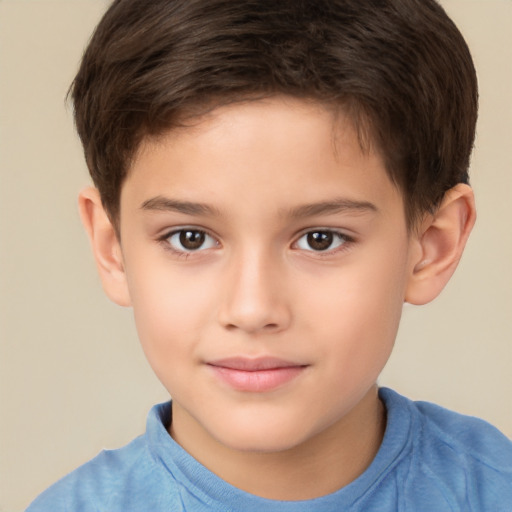 Joyful white child male with short  brown hair and brown eyes