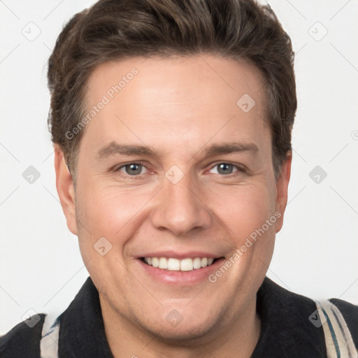 Joyful white adult male with short  brown hair and grey eyes