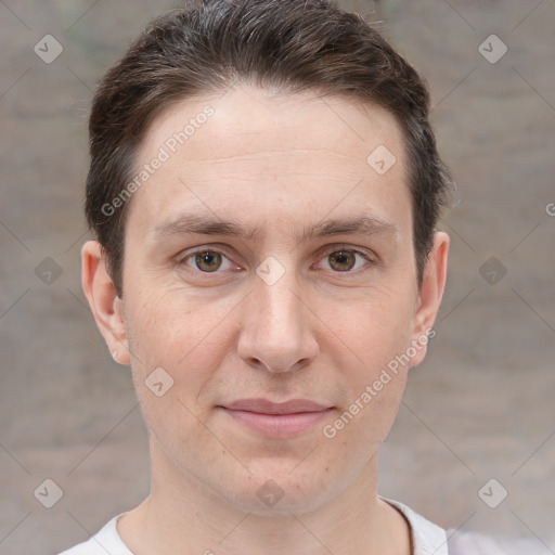 Joyful white adult male with short  brown hair and brown eyes