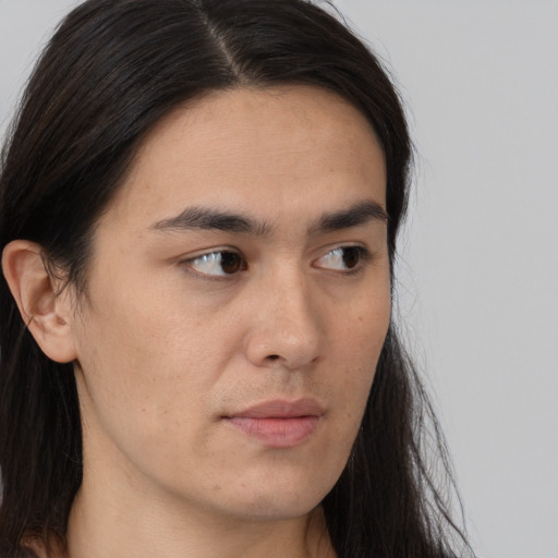 Neutral white young-adult male with long  brown hair and brown eyes