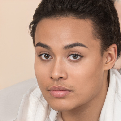 Neutral white young-adult female with short  brown hair and brown eyes