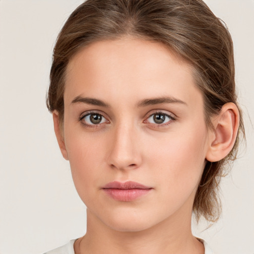 Neutral white young-adult female with medium  brown hair and grey eyes