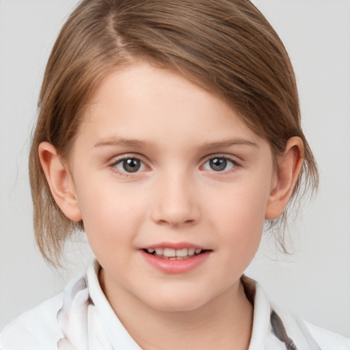 Joyful white child female with medium  brown hair and grey eyes