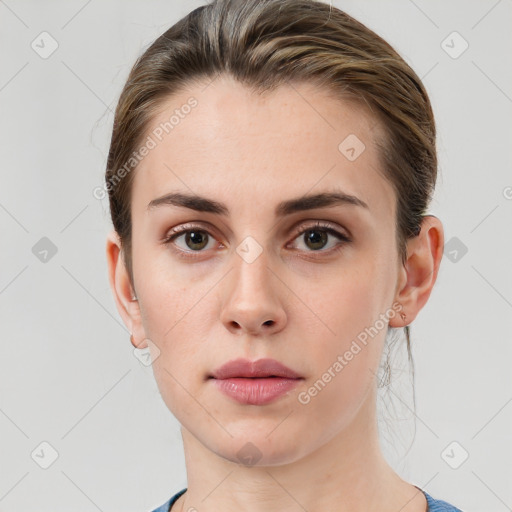 Neutral white young-adult female with short  brown hair and brown eyes