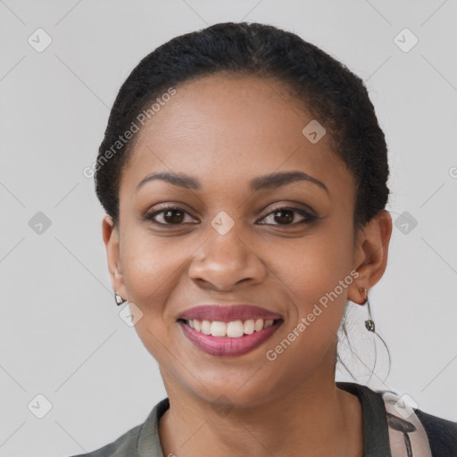 Joyful latino young-adult female with short  brown hair and brown eyes