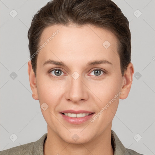 Joyful white young-adult female with short  brown hair and brown eyes