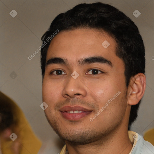 Joyful white young-adult male with short  black hair and brown eyes