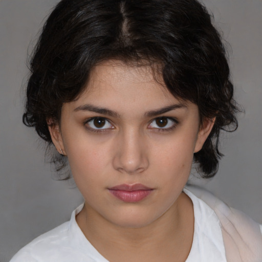 Neutral white young-adult female with medium  brown hair and brown eyes