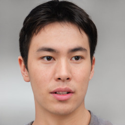 Neutral asian young-adult male with short  brown hair and brown eyes