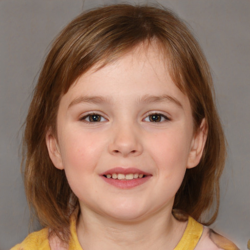 Joyful white child female with medium  brown hair and blue eyes